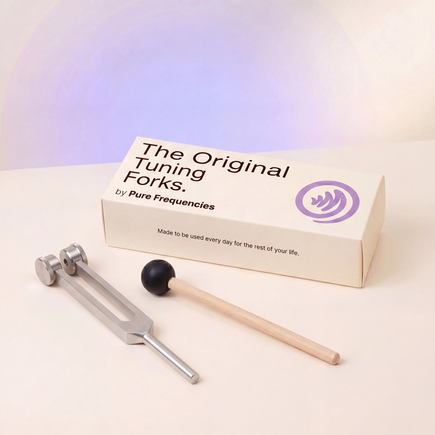 Tuning fork set with pure frequencies packaging on a gradient background