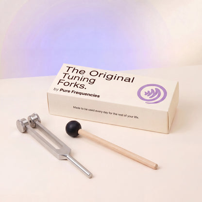 Tuning fork set with pure frequencies packaging on a gradient background